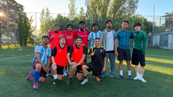 Twelve players after an evening game at SportsCo